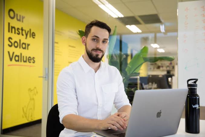 Working at a laptop in the office